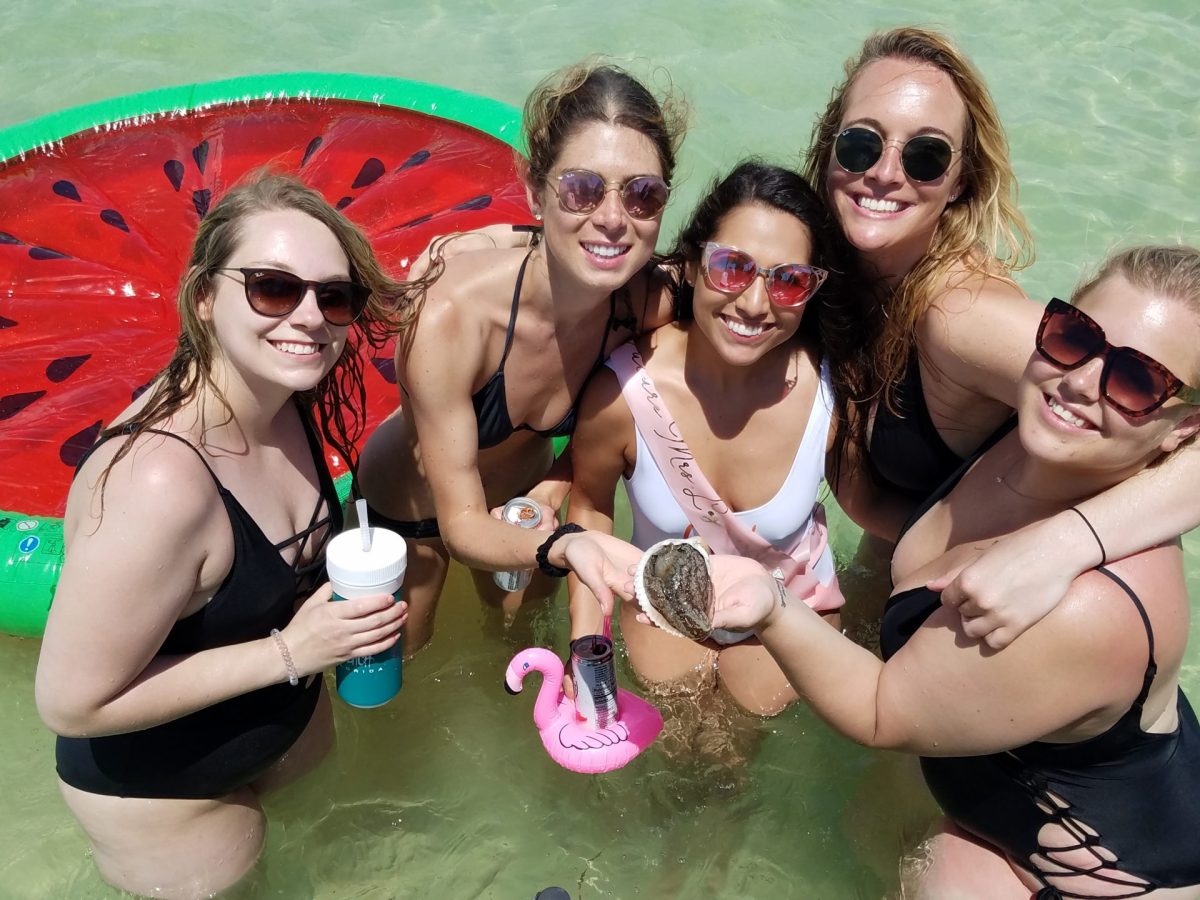 a group of women in a body of water