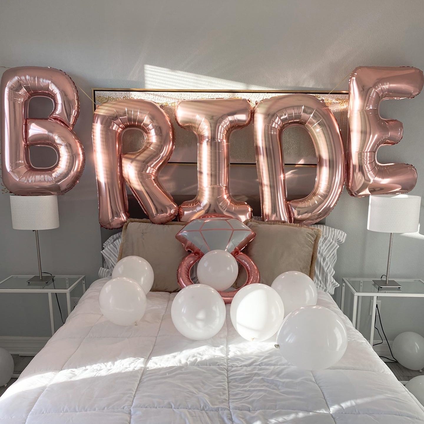 a made bed in a room with decorations